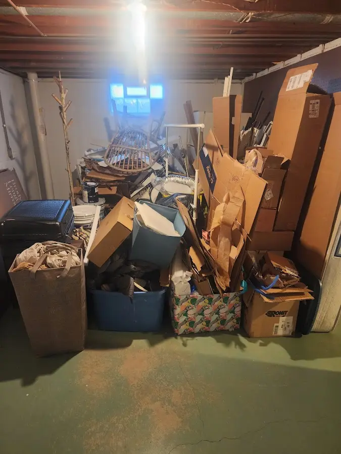 Roll-off dumpster container at job site for 15 Yard Dumpster Rental in Merrifield